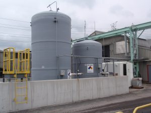 Dust suppression spray storage tanks.