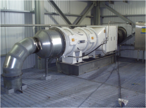 High volume wet dust extractor collection system. Metal ducting is connected to both ends of a dust collection machine.