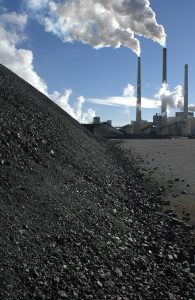 Coal piled near a power plant.