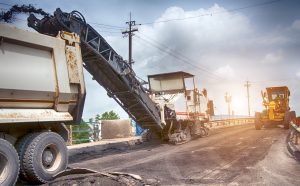 Loading material into a dump truck.